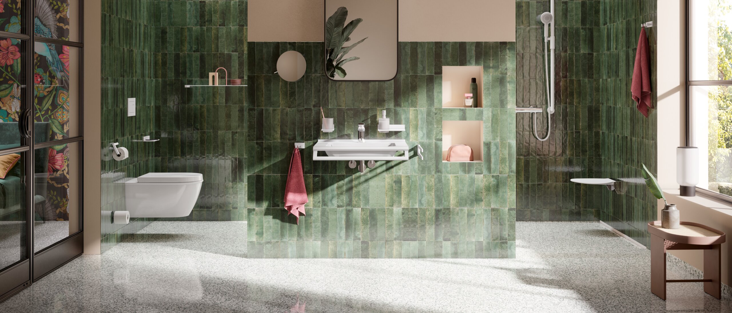 salle de bains avec carrelage vert, zone WC, zone douche et lavabo, équipée d'accessoires sanitaires blancs