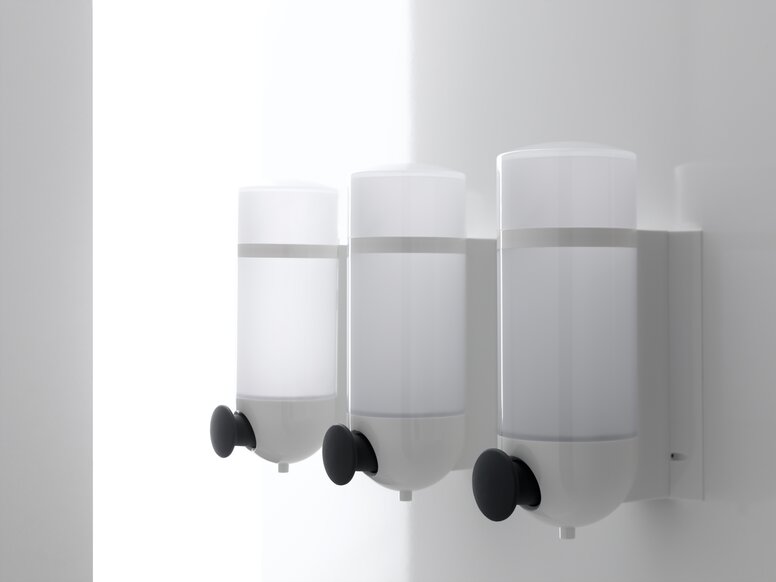 Distributeur de savon HEWI Blanc Trois distributeurs de savon HEWI au design cylindrique en polyamide blanc et bouton-poussoir en anthracite