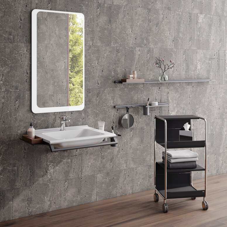 HEWI washbasin and side trolley Modular washbasin with grab rail and shelves, side trolley next to it in matt black