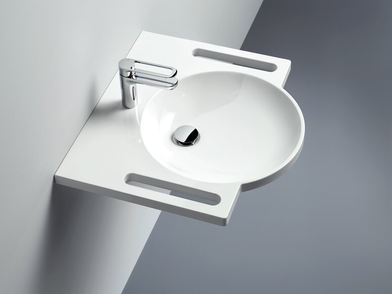 Table de toilette HEWI lavabo avec barre d'appui, vasque ronde et robinetterie monocommande en chrome